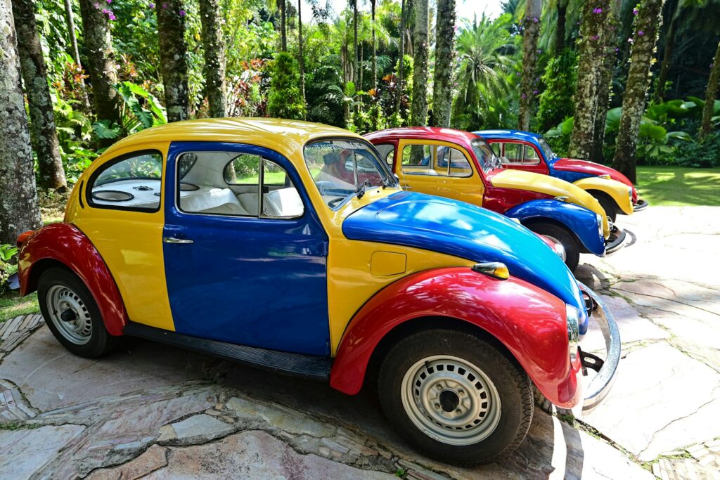 a row of colorful cars parked next to each other