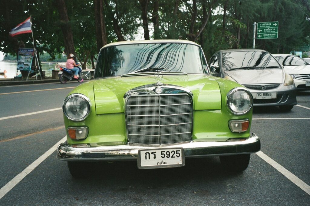 a green car on the street